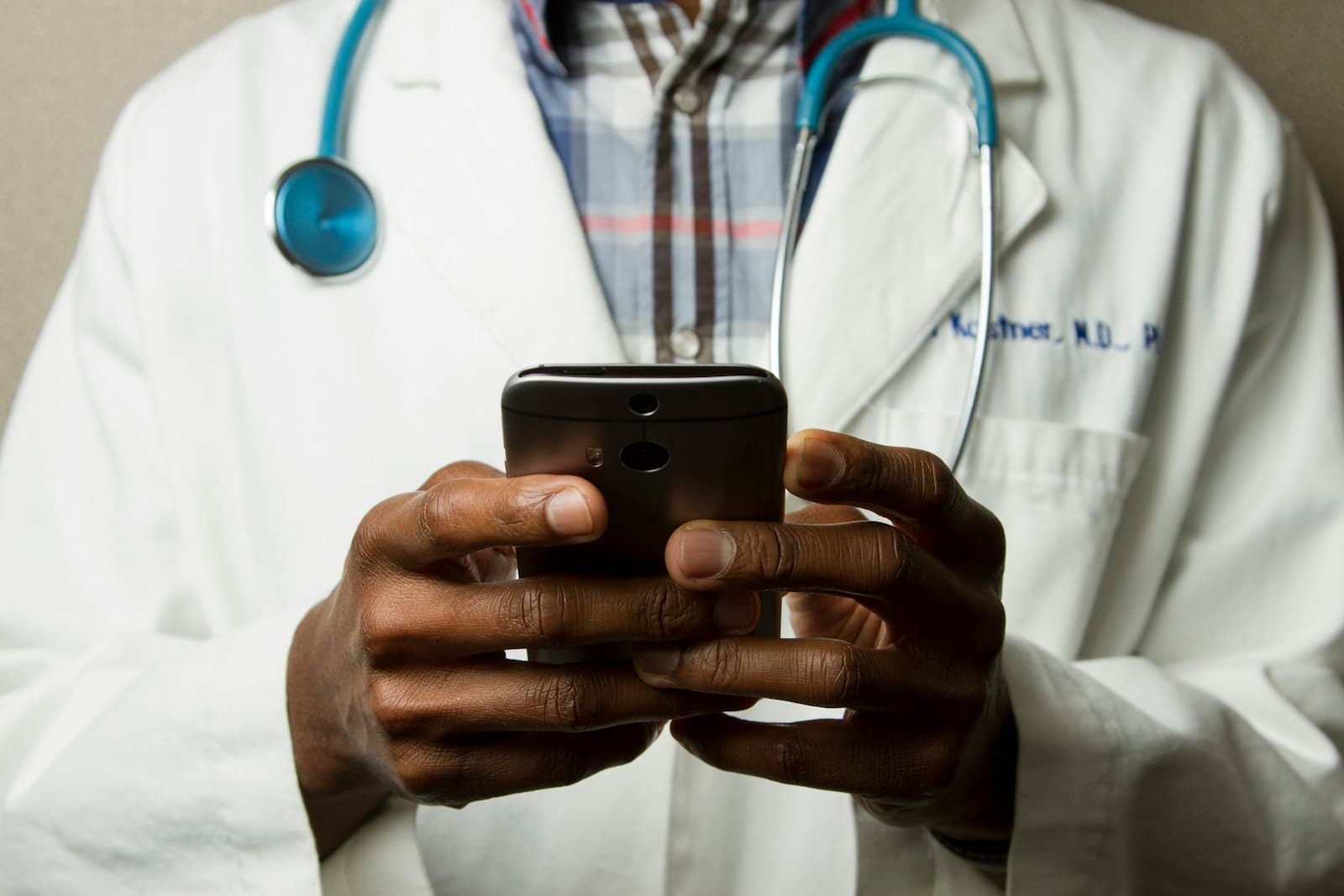 Physician reviewing a wellness plan with a client via telehealth